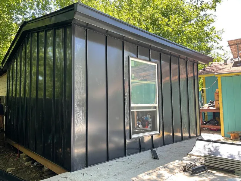 Black standing seam metal wall panels for Roof Inspection in Monterey