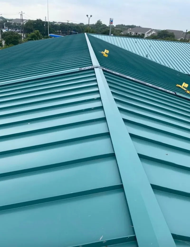 Green commercial metal roof ridge and valley for Metal Roof Repair in Monterey